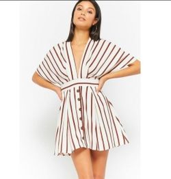 Forever 21 White striped plunging dolman mini dress
Size Medium
Excellent Like New Condition