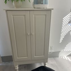 Cabinet, three shelf, white, 51”H X 29.5”W  X 17.25”D