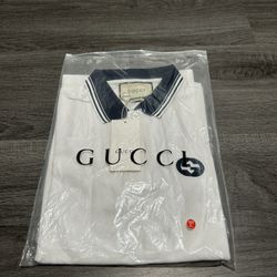 White and navy Gucci polo shirt