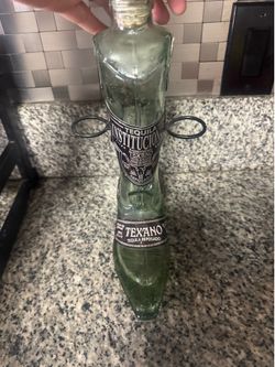 Empty boot collectible tequila bottle