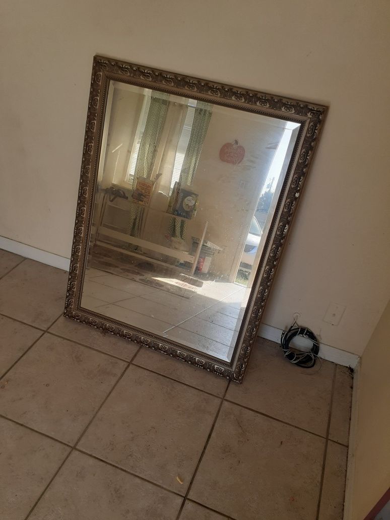 Wall mirror an curtain rod