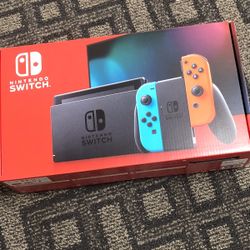 Brandnew Nintendo Switch with Neon Blue and Red Joy-Con