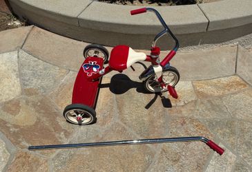 Red Radio Flyer Tricycle with removable push handle