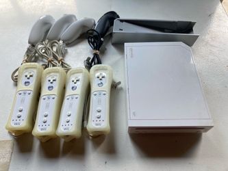 Wii with Remotes and Games