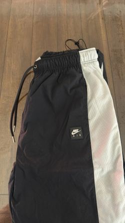 Black and white Nike trackers