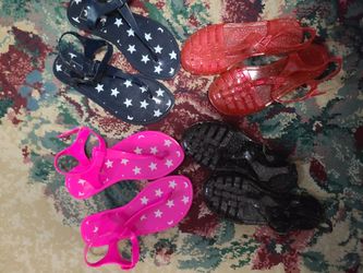 Girls sandals size 1 red and black and size 2 is stars