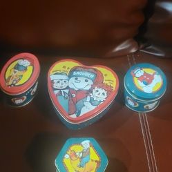 vintage 1998 Snowden Raggedy Ann & Andy collectible tins. 
The tins were produced by Target stores as part of a holiday promotion. 
The collection inc
