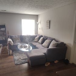 Wrap Around Couch And Table