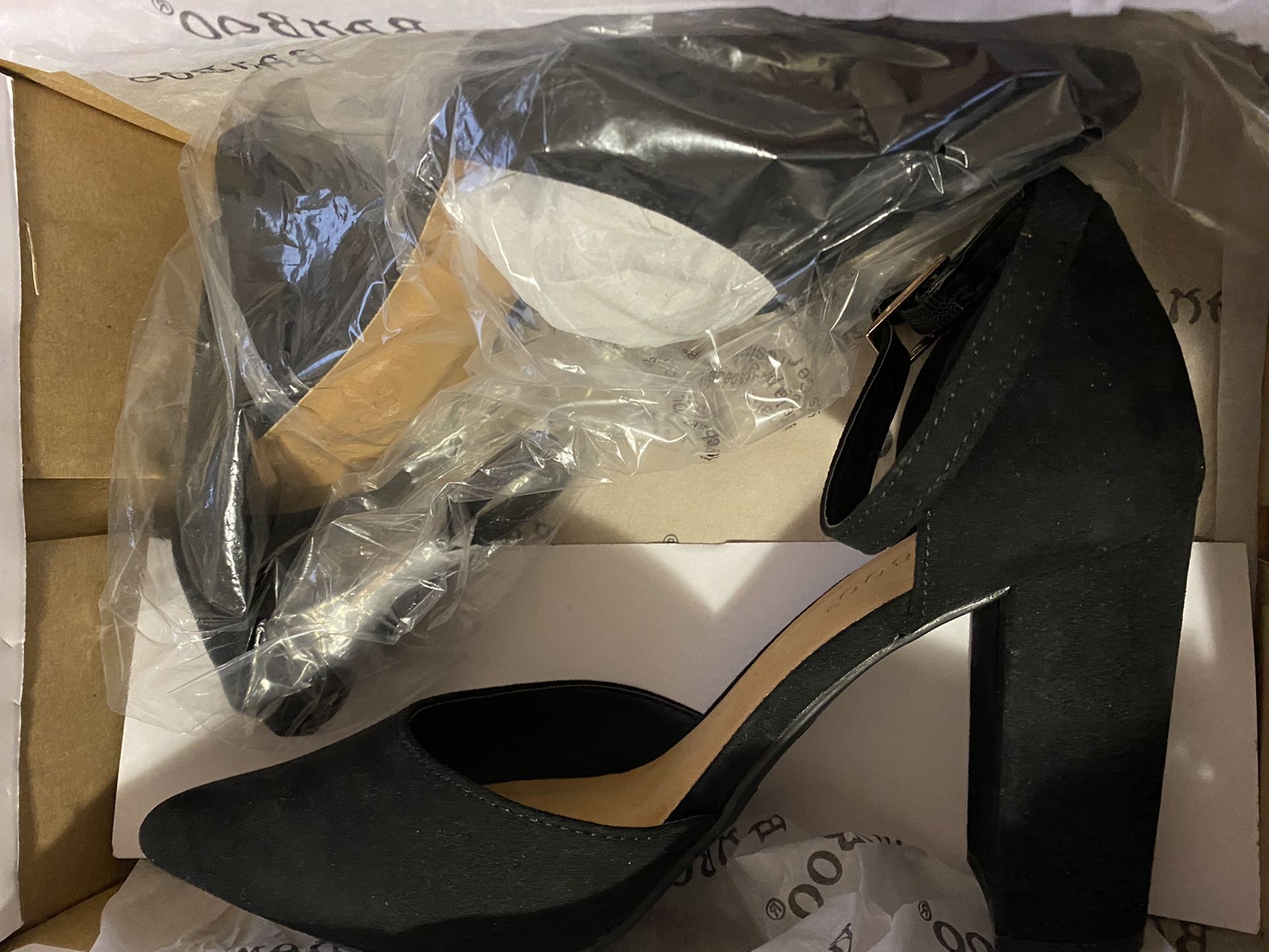 Close toed black heels