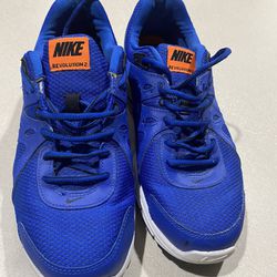 Nike shoes Revolution 2. Dodger blue with orange. These shoes are 8.5 in men’s. 