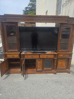 TV stand with TV.  $400 . Need gone ASAP