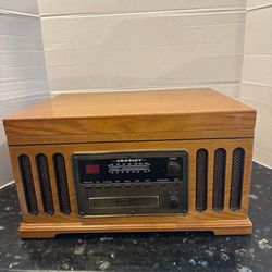 Crosley CR837 Entertainment Center Turntable Vinyl Player/AM/FM/Aux/Radio everything works perfect and has been tested, brand new, never used it and t