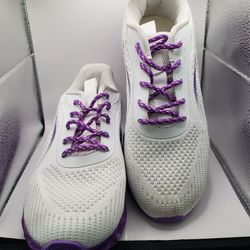 Size 8.5--9 pair of white and purple athletic running shoes By Tiamou