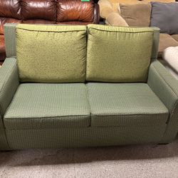 Green Pull-Out Sofa – Compact & Practical