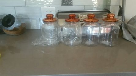 Glass jars copper color air tight lids