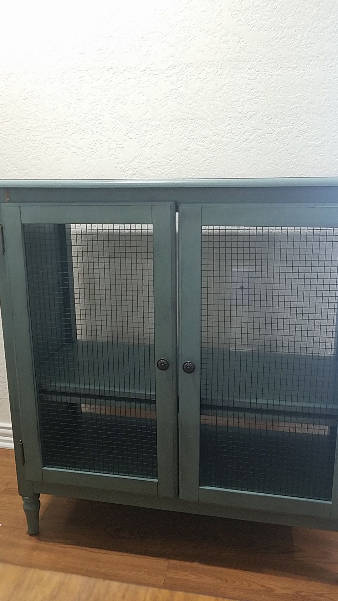 Teal county style home cabinet