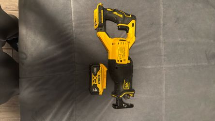 DEWALT 20V MAX XR Brushless Reciprocating Saw with a 4Ah battery included.