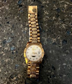 Croton watch gold plated shows wear
