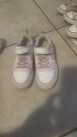 Pink and white girls nike size 12