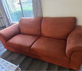 Orange Loveseat Sofa – $50