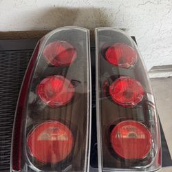 2007 two 2013 Yukon or Tahoe tail lights