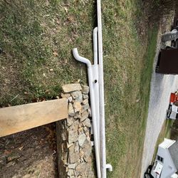 METAL GUTTER AND DOWN SPOUTS. ROUNDED