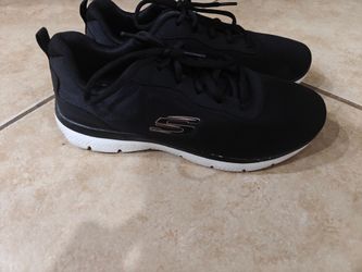 Women's Skechers black athletic sneakers with rose gold side logo, size 8 1/2