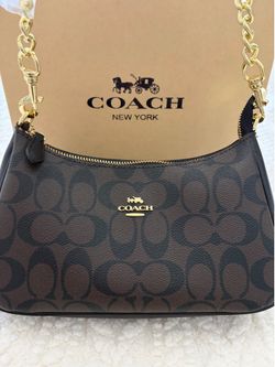 Dark brown Teri coach purse