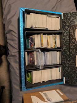 Large Lot of Pokémon Trading Cards and more