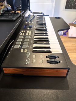 Keylab essential 49 arturia with stand