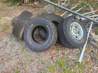 T265/75R16 and one Dodge rim free