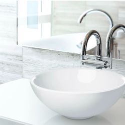 Brand new in box. 17” X 6”.  With overflow. 2 available. Chrome Pop up and drain hose included) Beautiful Round Bathroom Porcelain Ceramic Vessel Sink