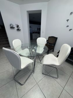 Glass and leather Dining table for 4