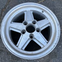 One 15x7 REI rim. Ronal R9 clone Fits Chevy cars and trucks