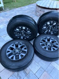 A set of 2023 Toyota Tacoma tire  and wheels-factory