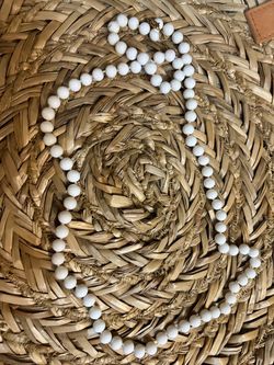 Beautiful long white beaded necklace