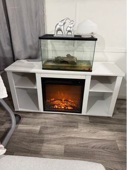 SE VENDE MESA DE CHIMENEA CON SOLO 3 MESES DE YSO POR $100