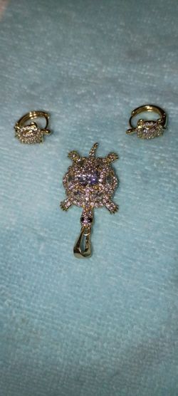 Gold-plated cubic zirconia turtle jewelry set.