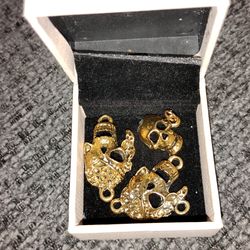 3 skull pendants