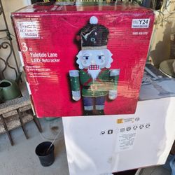 3 ft. Yuletide Lane LED Light Up Outdoor Tinsel Nutcracker Christmas Decoration. 