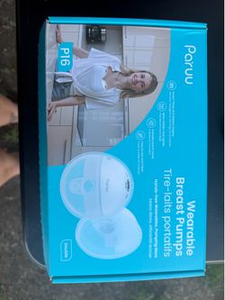 Hands free breast pumps