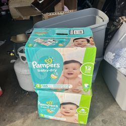2 Boxes Size 2 Pampers