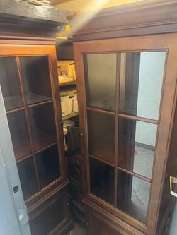 A pair of cabinets with lights