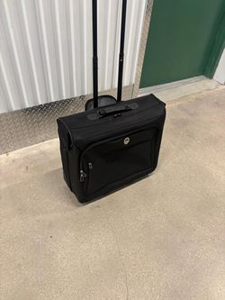 Travel Pro suits and dresses luggage on wheels . 23 “ wide , 20” high $50