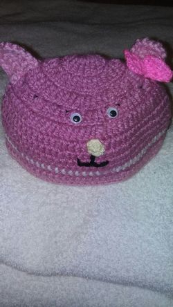 Bear with a bow hat.