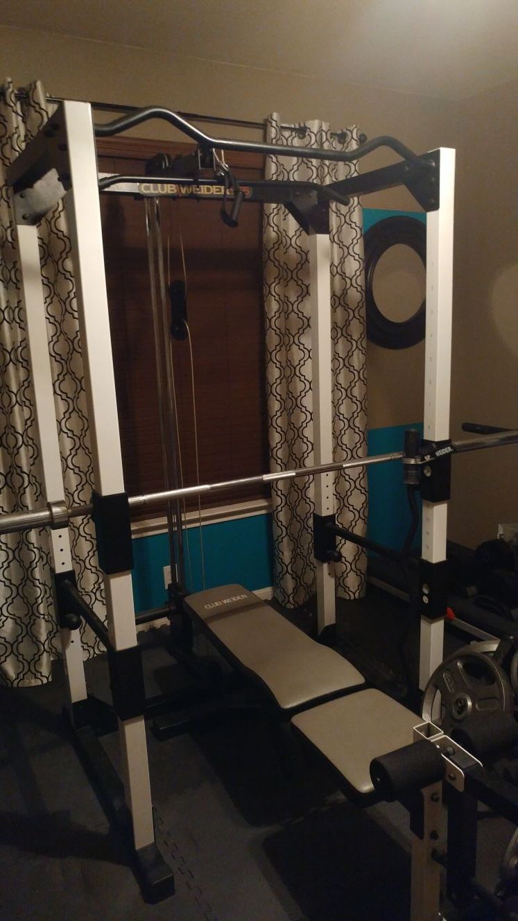Club Weider 565 Power Rack w bench 2 weight trees Olympic bar curl bar 255lbs of Olympic weights for Sale in Cibolo TX OfferUp