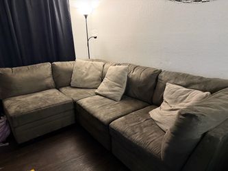 Suade sectional and matching ottoman
