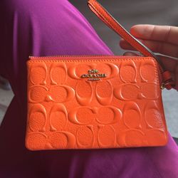 Coach Orange Patent Leather Embossed Logo Wristlet Like New