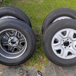 2024 18" Yokohama tires And Toyota Sequoia Stock Rims.