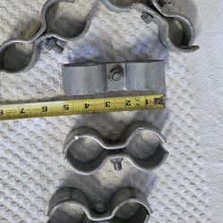 Chain link fence panel clamps